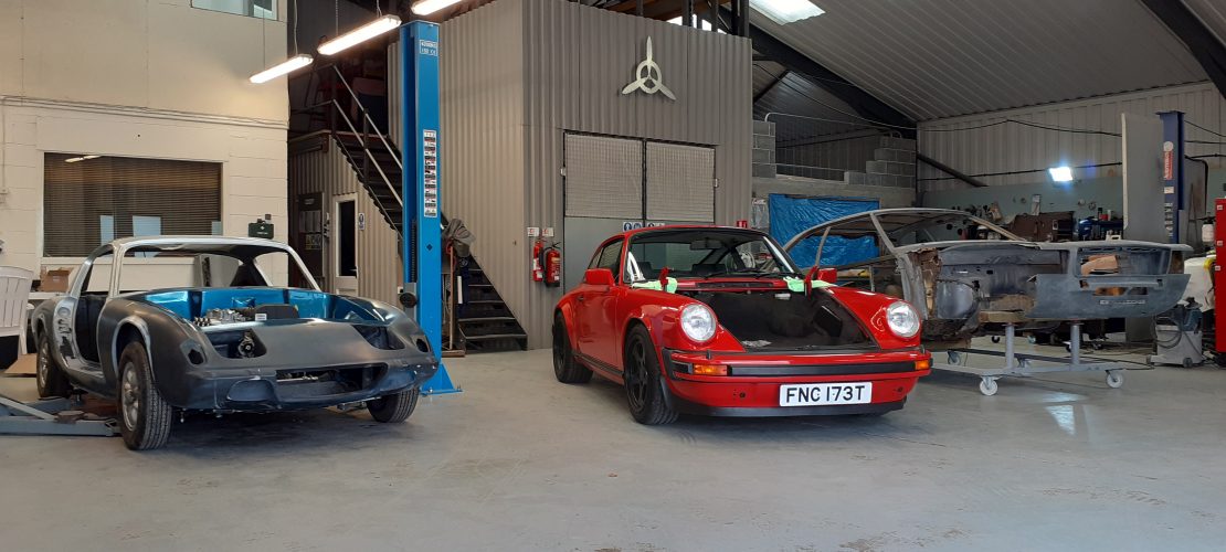 RUF Porsche 911 and an image of the inside of our classic car restoration workshop